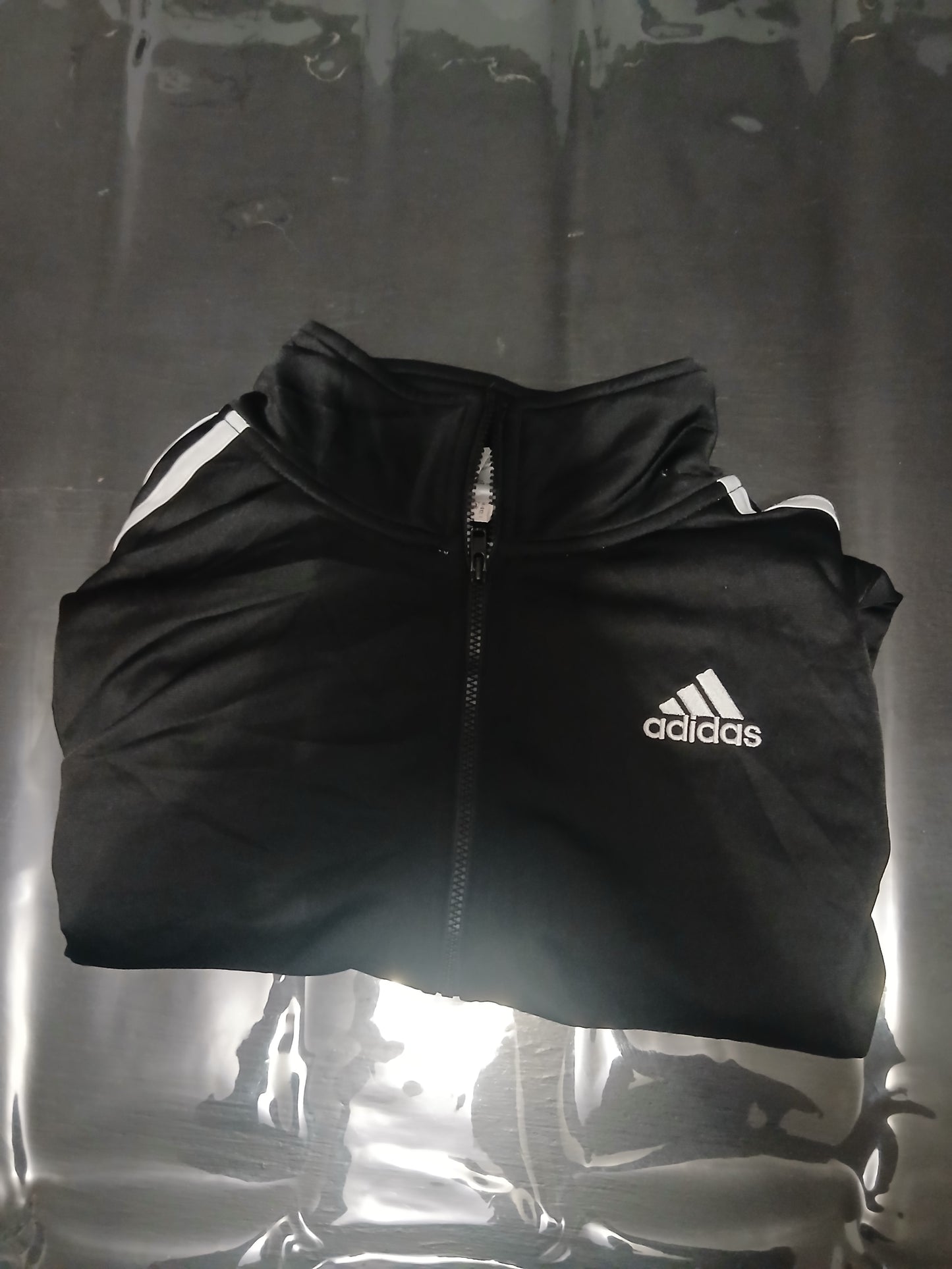 Veste de survêtement à fermeture éclair intégrale (Full-Zip Track Jacket).